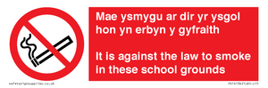 Mae ysmygu ar dir yr ysgol hon yn erbyn y gyfraith It is against the law to smoke in these school grounds - Bilingual Welsh / English